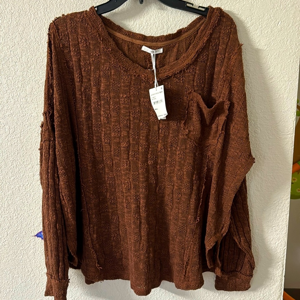 Stitchdrop V Neck sweater with pockets